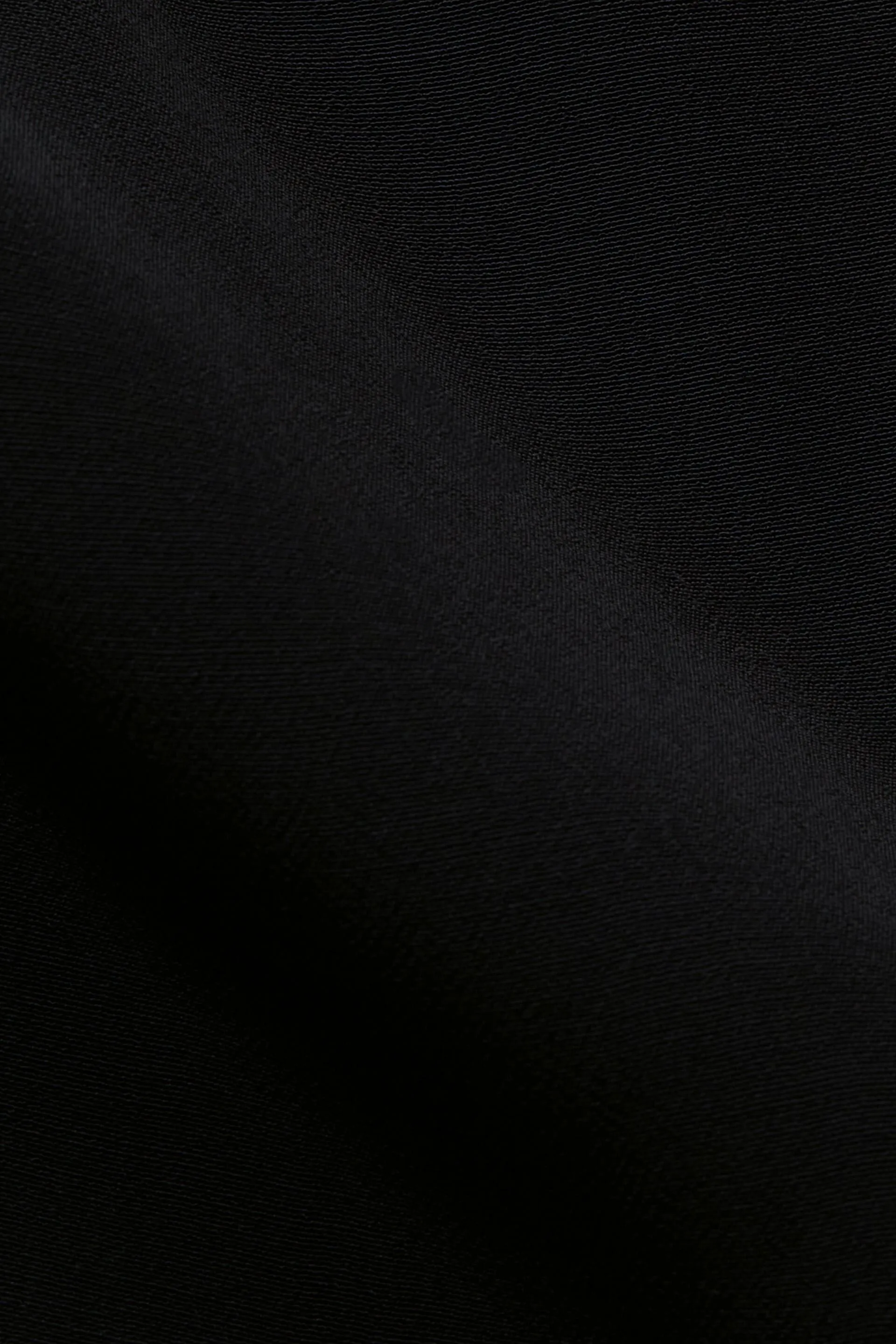 Blusa con bottone davanti