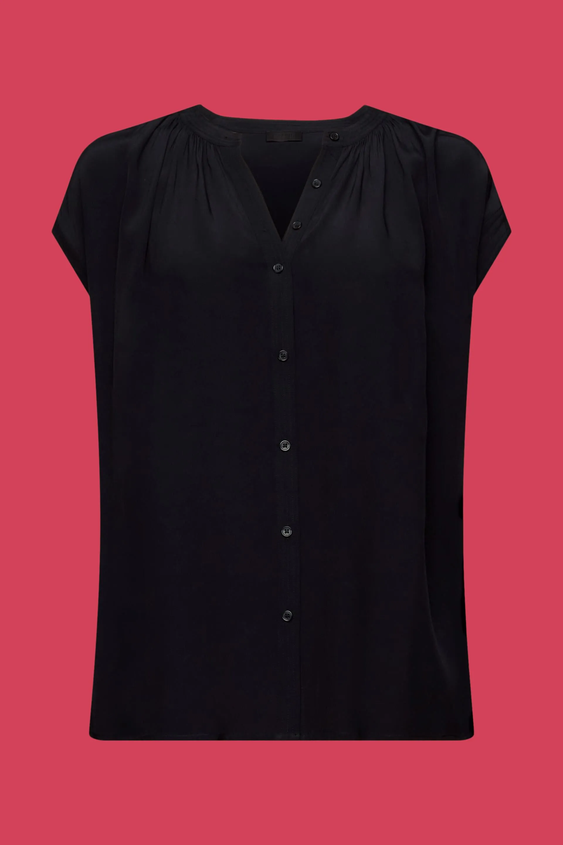 Blusa con bottone davanti